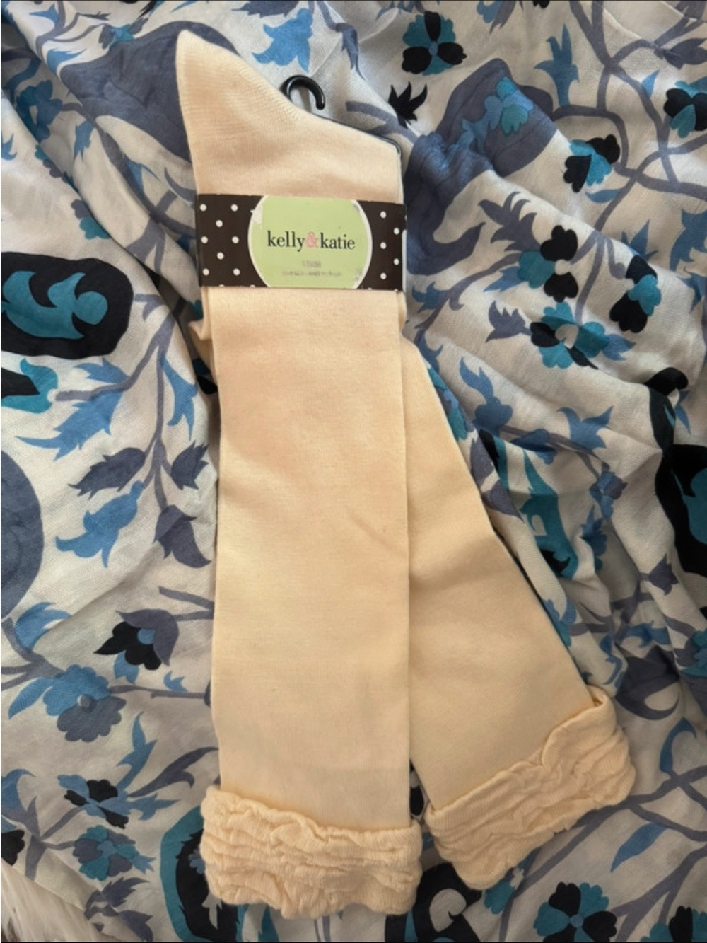 Ivory knee-high socks with ruffle trim